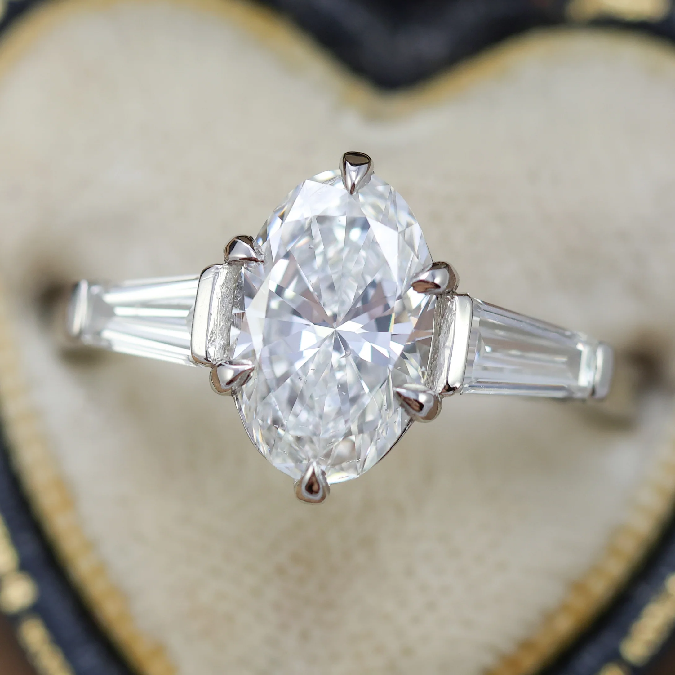 1.91Ctw Platinum Three Stone Oval Diamond And Baguette Engagement Ring