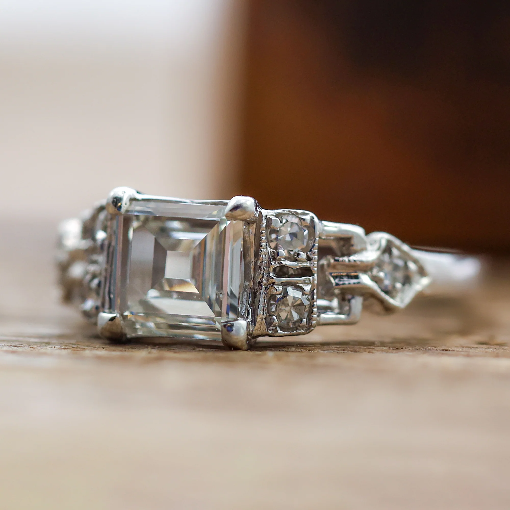 Art Deco Step Cut Diamond  Set In A Platinum Millgrain Ring With Six Single Cut Diamonds. - Image 3