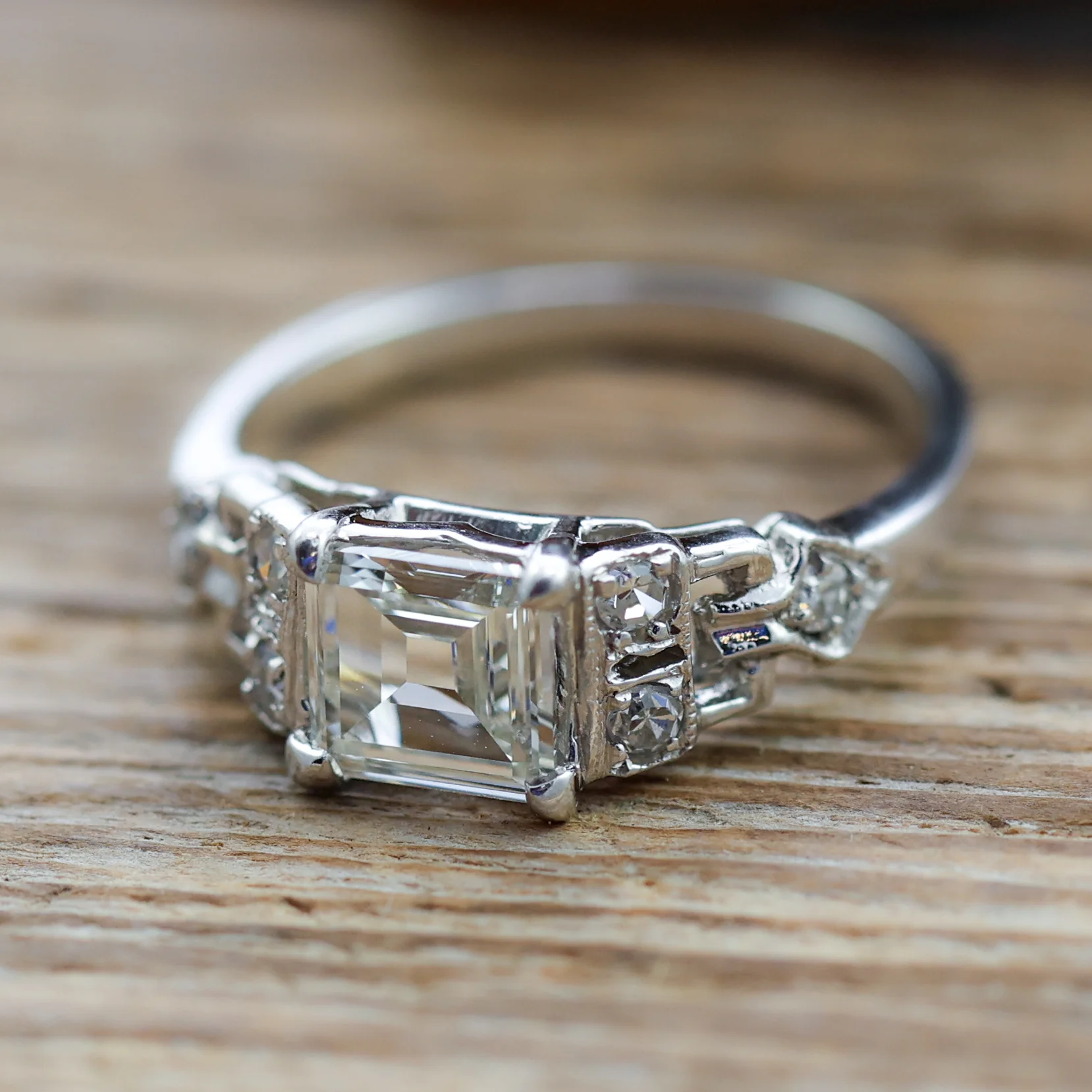Art Deco Step Cut Diamond  Set In A Platinum Millgrain Ring With Six Single Cut Diamonds. - Image 4