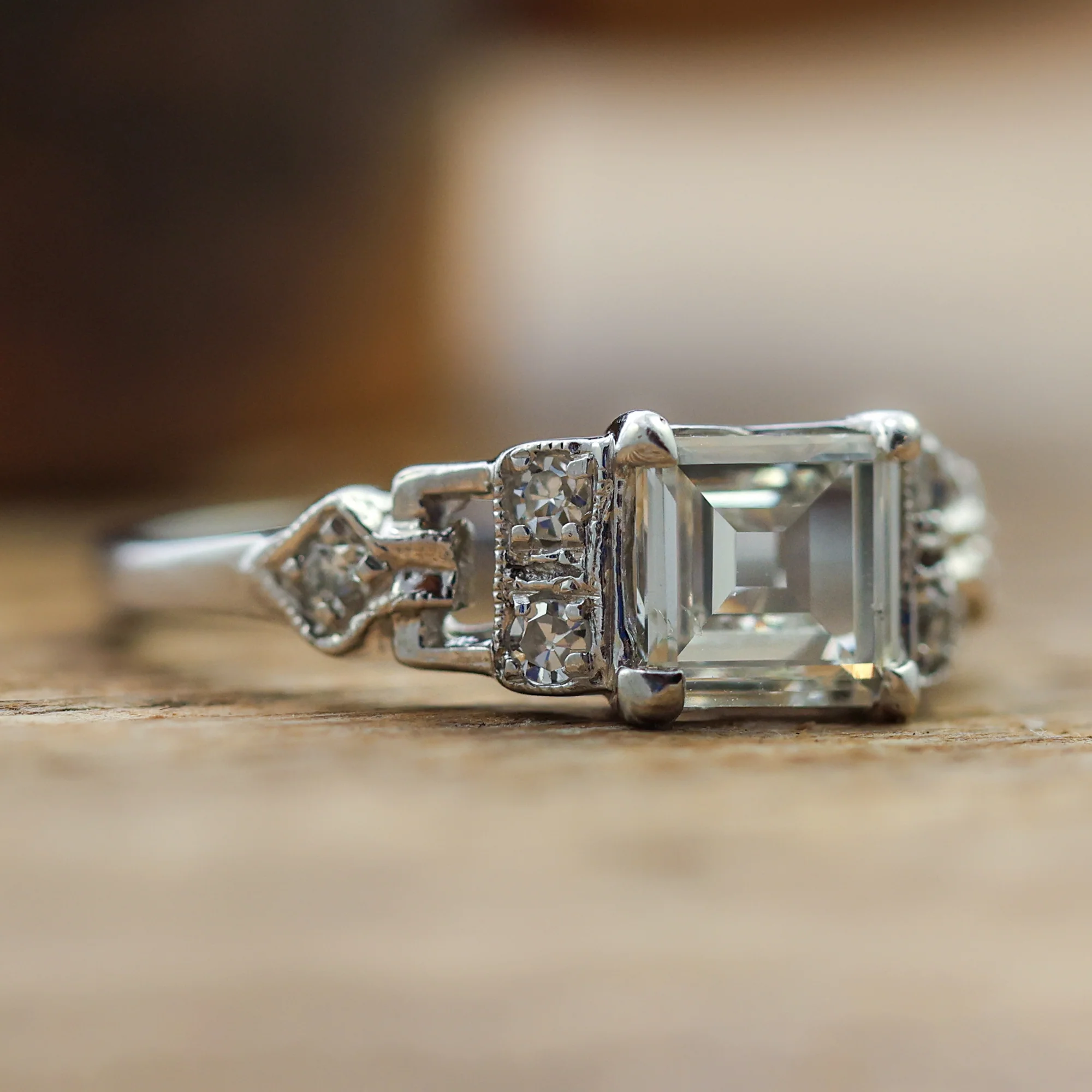 Art Deco Step Cut Diamond  Set In A Platinum Millgrain Ring With Six Single Cut Diamonds. - Image 5