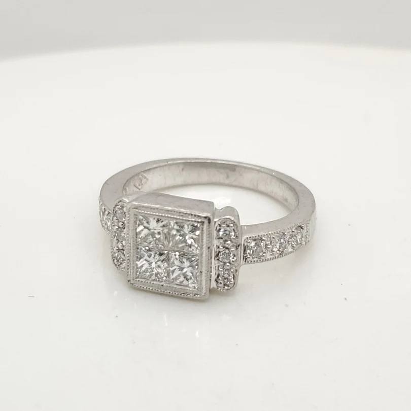 Platinum Round And Princess Cut Diamond Ring