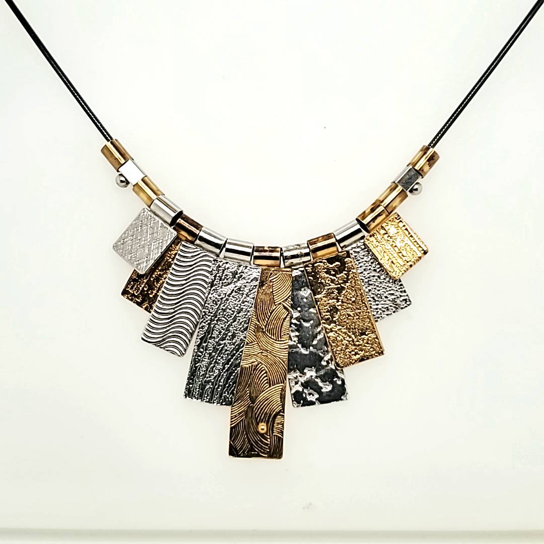 Q Evon 9 Tab Mixed Metal Necklace